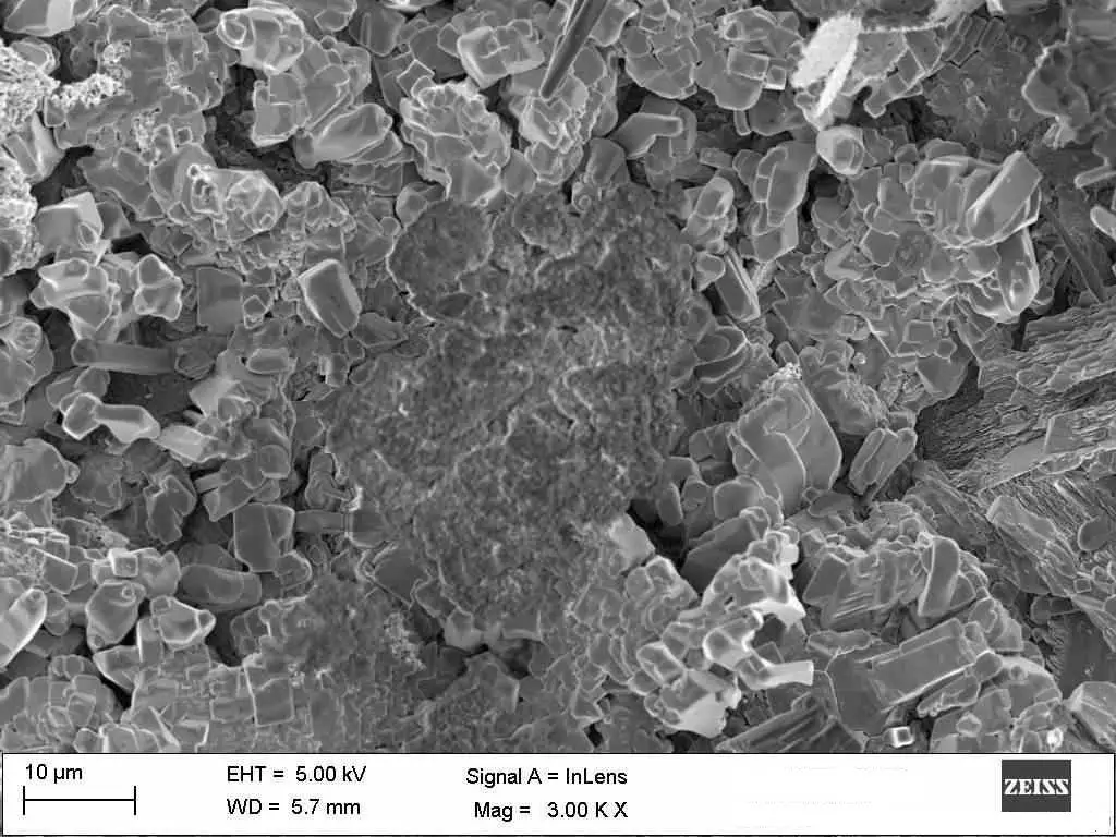 Particle size as seen under electron microscope in microns